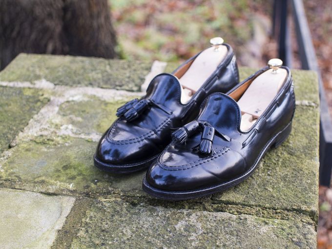 Black shell cordovan tassel loafers by Alden, in the Aberdeen last.​​