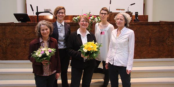 The Christina Conference of Gender Studies 2013 keynote speakers (except for Jack Halberstam, who had already left for the airport) and organizers with their flowers at the end of the conference in the University of Helsinki Small Hall. Davina Cooper (left), Nina Järviö, Tuija Pulkkinen, Kaisa Pekkala, and Tina Chanter.​