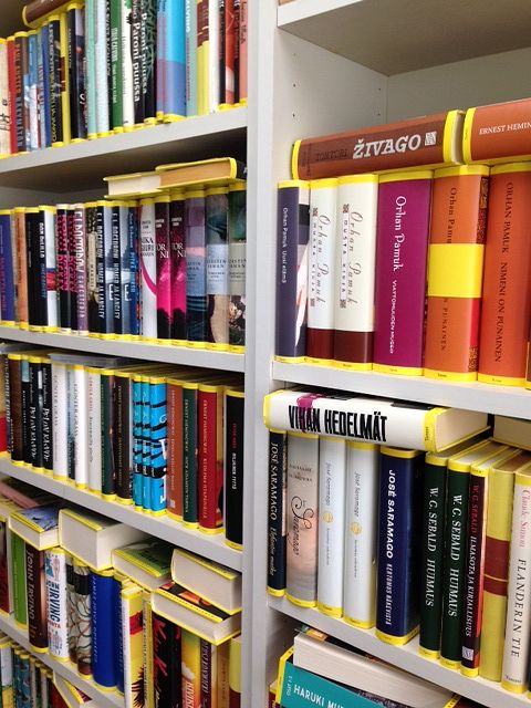Copies of Keltainen kirjasto (‘The Yellow Library’) publication series by Tammi Publishers on Päivi Koivisto-Alanko’s bookshelf.​