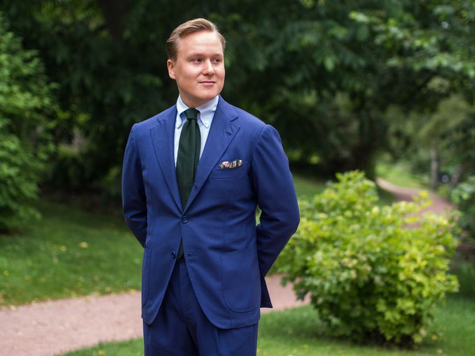 Wearing a Blue Suit with a Green Tie