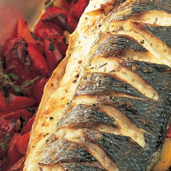 Baked Sea Bass with Roasted Red Peppers, Tomatoes, Anchovies and