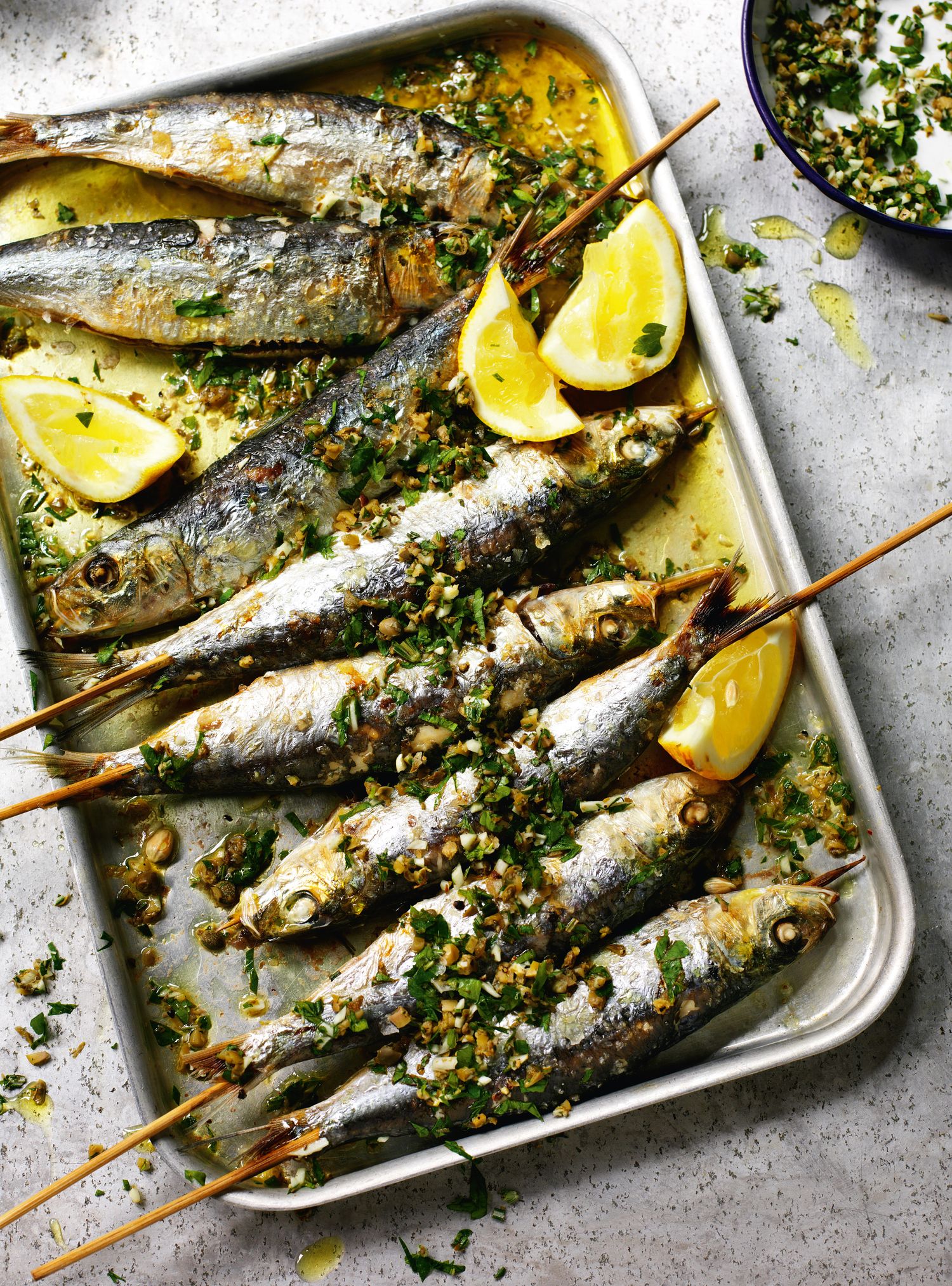 Grilled sardines with coarsely chopped green herbs - The Happy Foodie