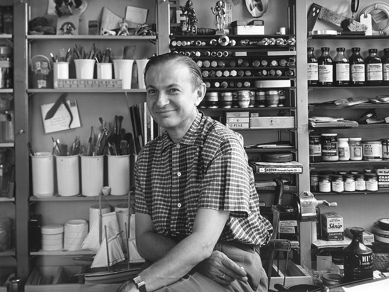 A black and white portrait of Alexander Girard