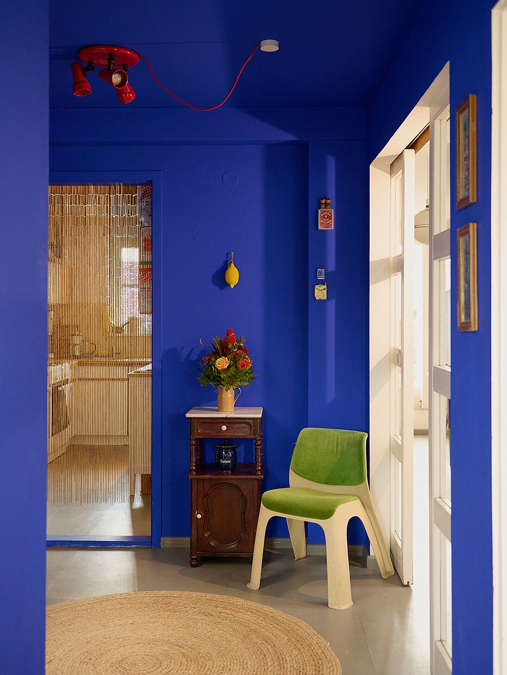 Hallway with blue walls and ceiling