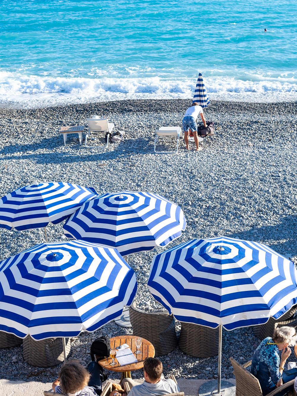 Blue-and-white parasols in Nice