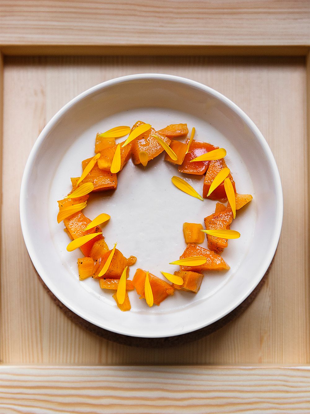 Pieces of persimmon on a plate