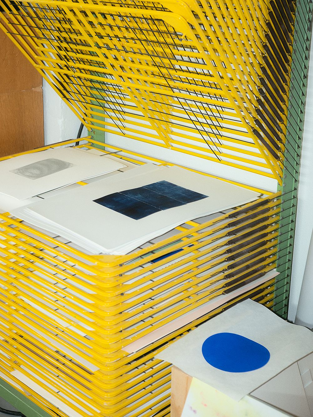 Yellow drying rack for art prints