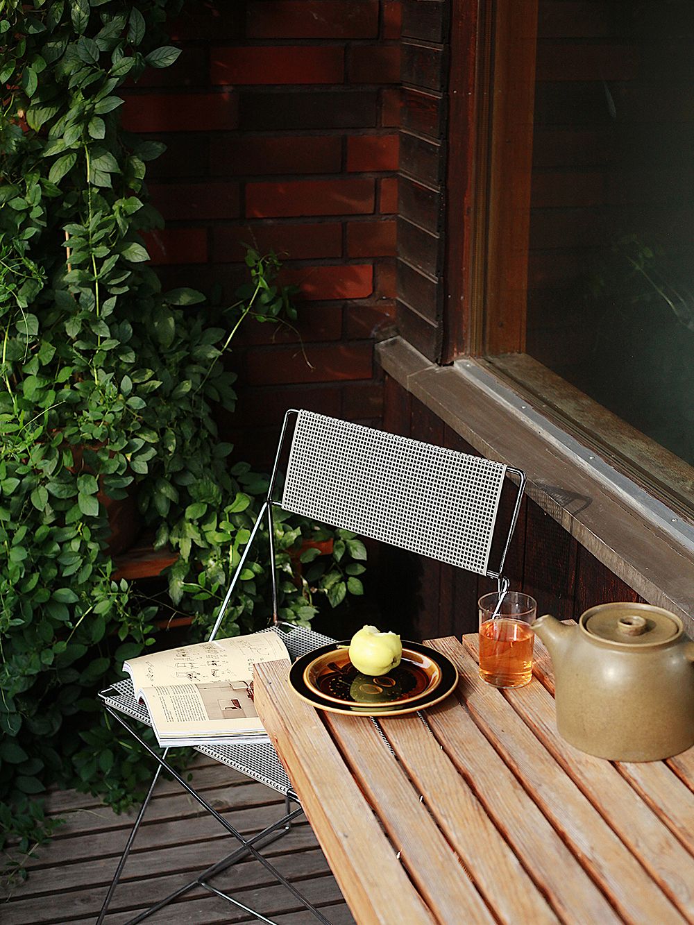 A chair outdoors on a terrace