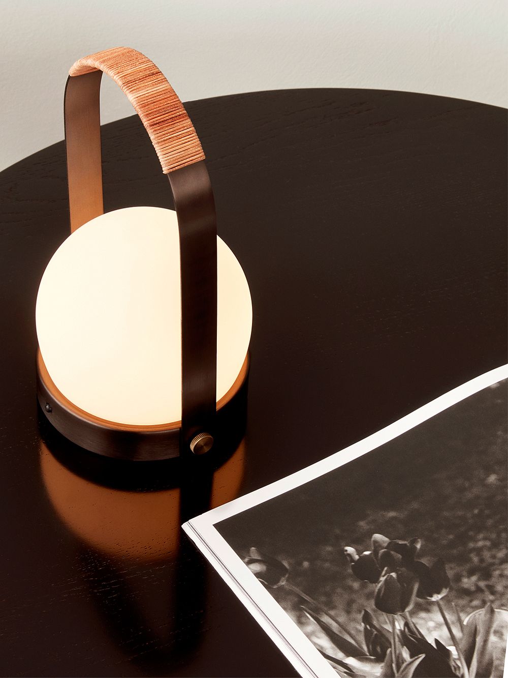Menu Carrie table lamp in bronzed brass
