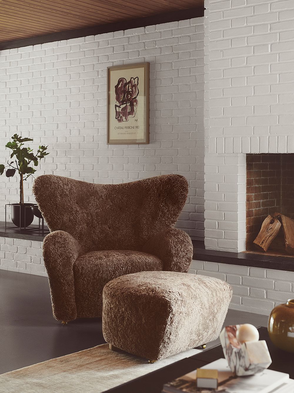 By Lassen  The Tired Man armchair and ottoman