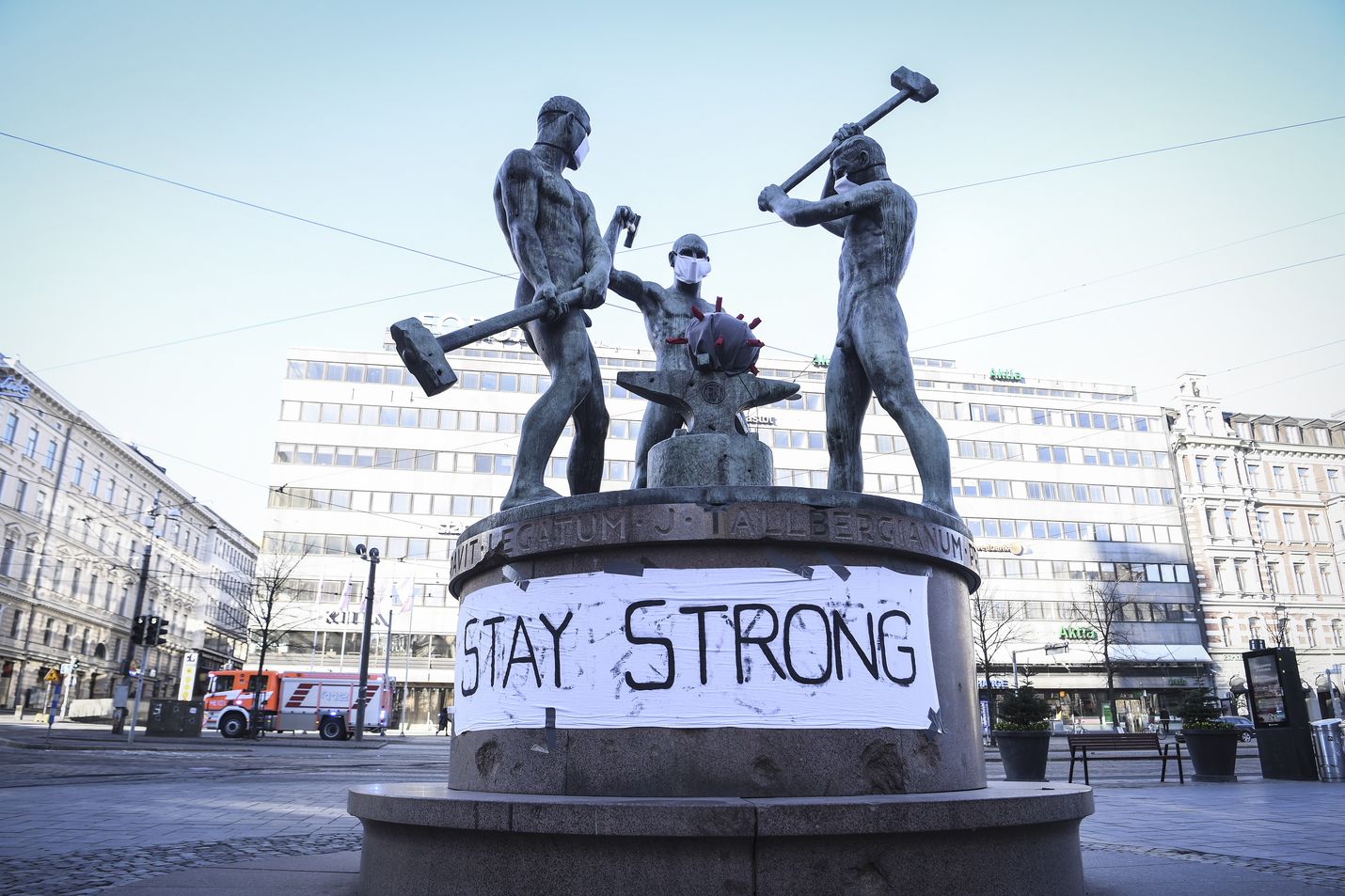 A banner at the Three Smiths Statue reads 'Stay Strong' in Helsinki, Finland, 31 March 2020. According to the Finnish Institute for Health and Welfare, THL, Finland has registered at least 1,615 COVID-19 cases, the disease caused by the novel coronavirus SARS-CoV-2.