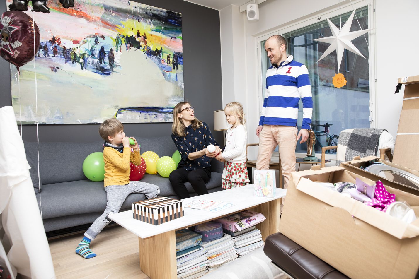 The young family of Saku Oikarinen and Heini Ynnilä with children Eliel Ynnilä and Linnea Ynnilä celebrated vappu at home in Jätkäsaari district of Helsinki. The parents said they had scaled back some of their consuming connected to their moving house, due to the corona virus pandemic.