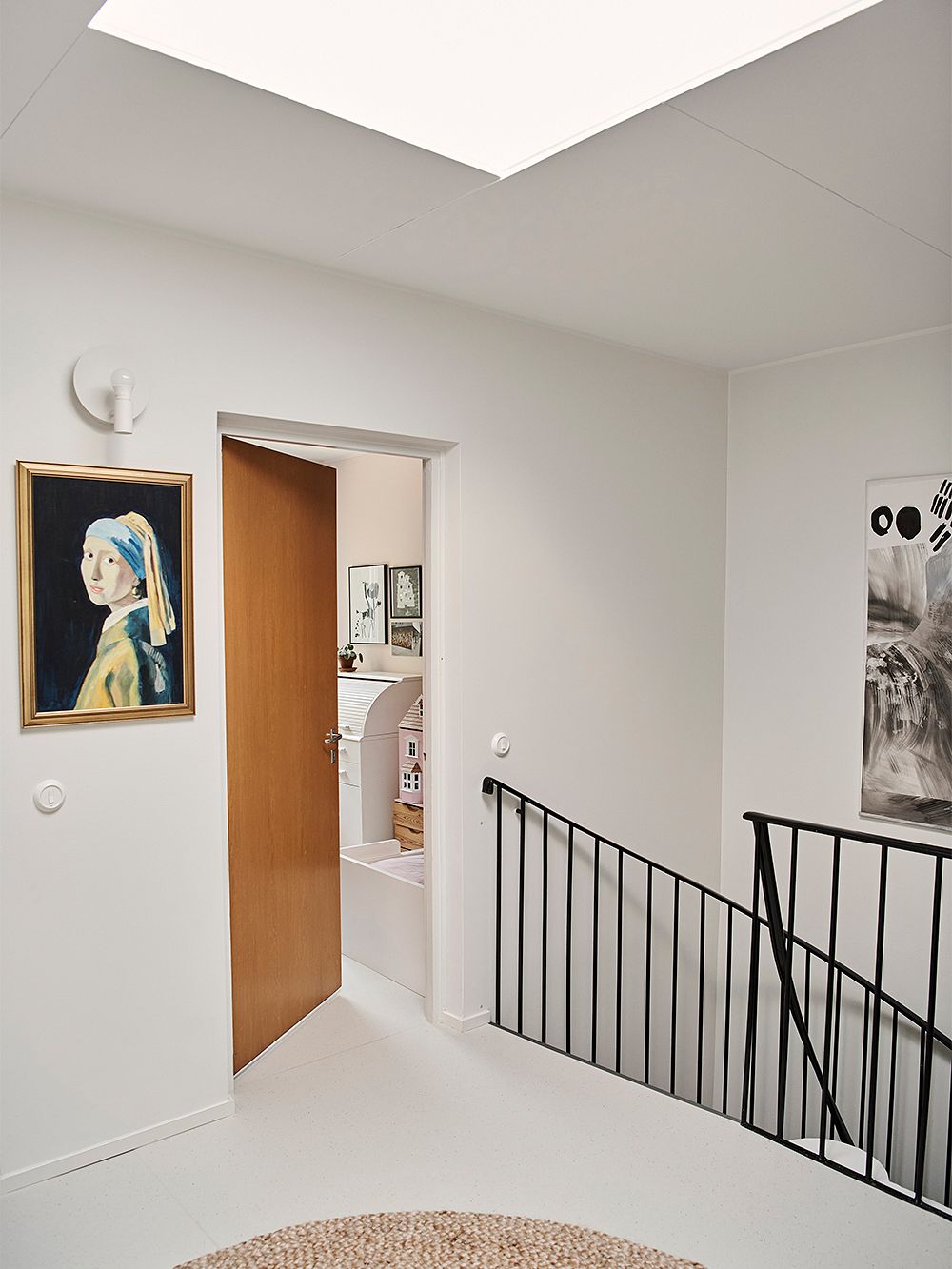 An image of Asli Ufacik's home: the hallway decor.