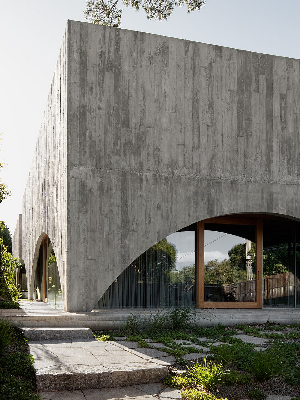 An image of Edition Office's Hawthron House. This image focuses on the concrete façade.