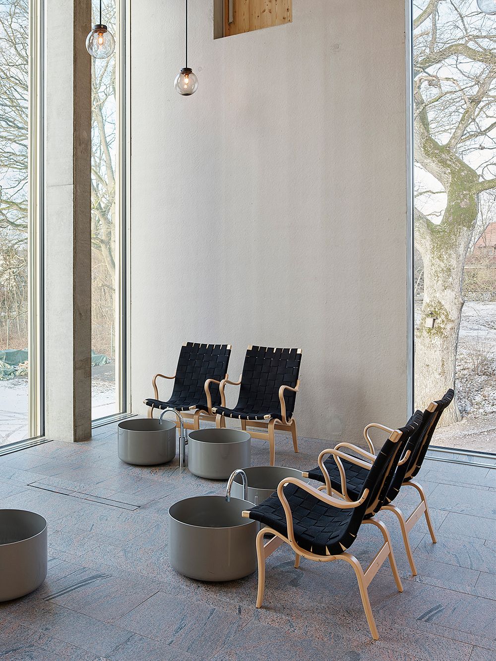 An image of Andrum spa's interior with Bruno Mathsson's Eva chairs as part of the interior.