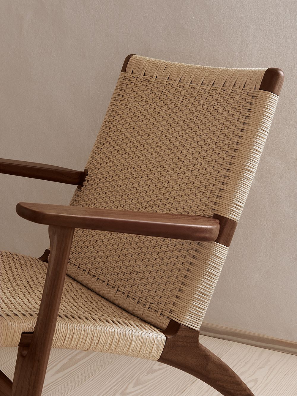 A close-up image showing the details of Carl Hansen & Søn's CH25 chair .