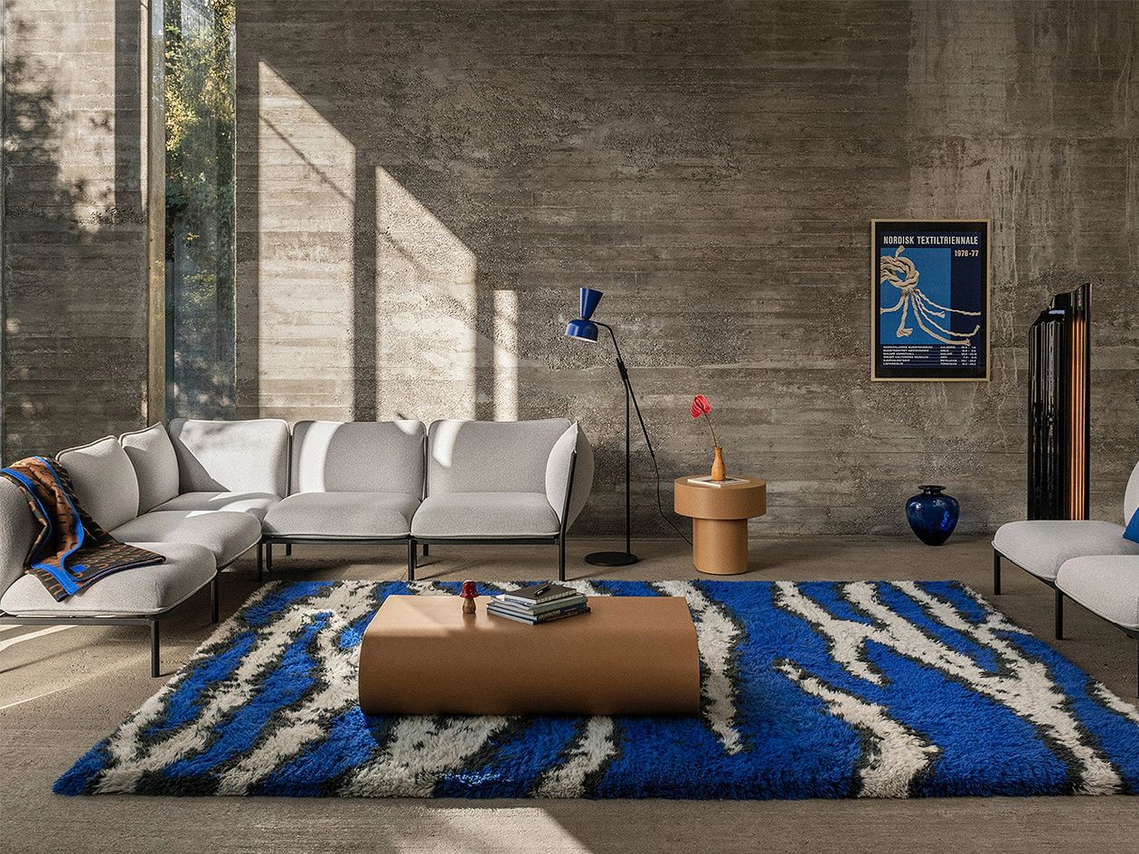 Hem's ultramarine blue Monster rug in a living room.