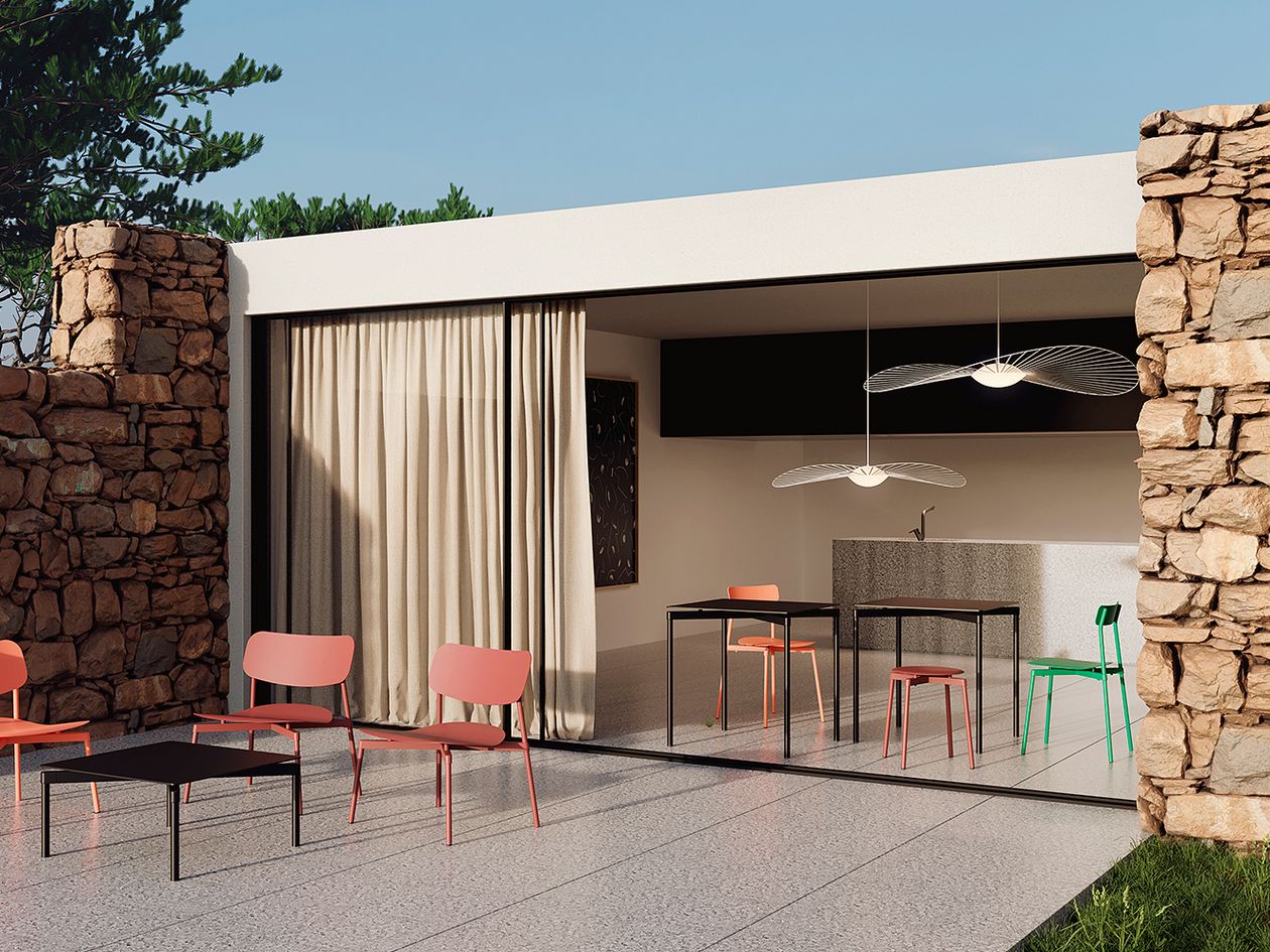 An image of Petite Friture's Fromme chairs and tables placed both indoors and out.