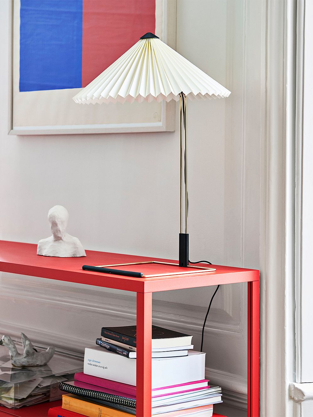 Hay's Matin table lamp in white on a sideboard.