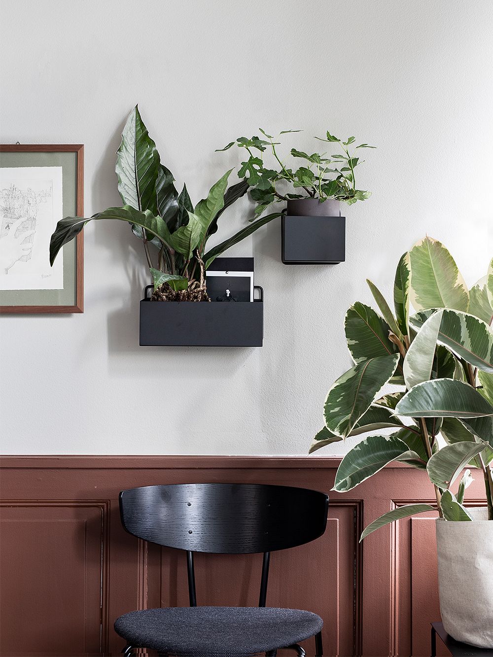 Ferm Living's Wall Box planters attached to a wall.