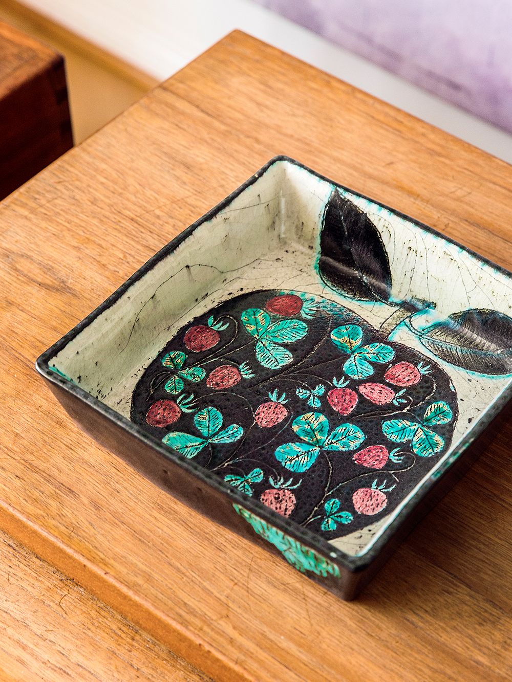 An image of a ceramic bowl placed on a table.