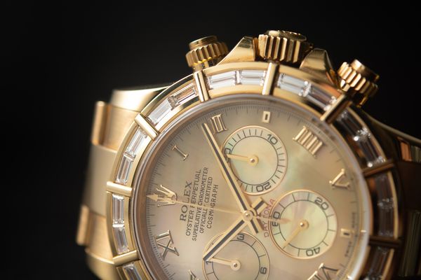 Lot 58 Rolex Daytona MOP and diamond bezel