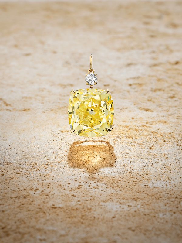 Fancy Vivid Yellow diamond and diamond pendant, weighing 53.14 carats, Internally Flawless