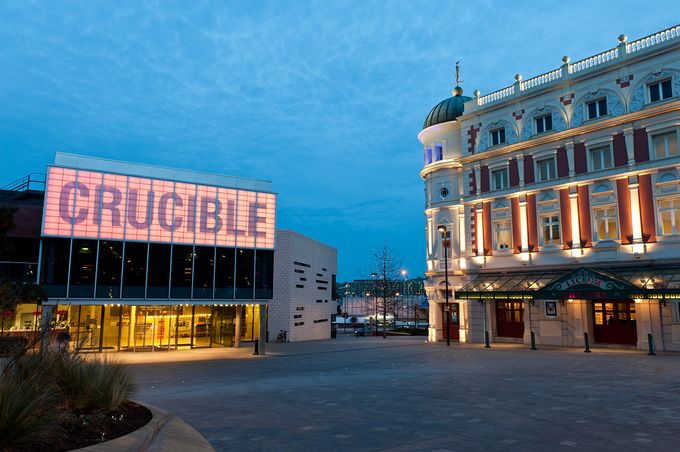 Night time image of the Sheffield theatres complex comprising of the crucible, lyceum and stage theatre in sheffield city centre